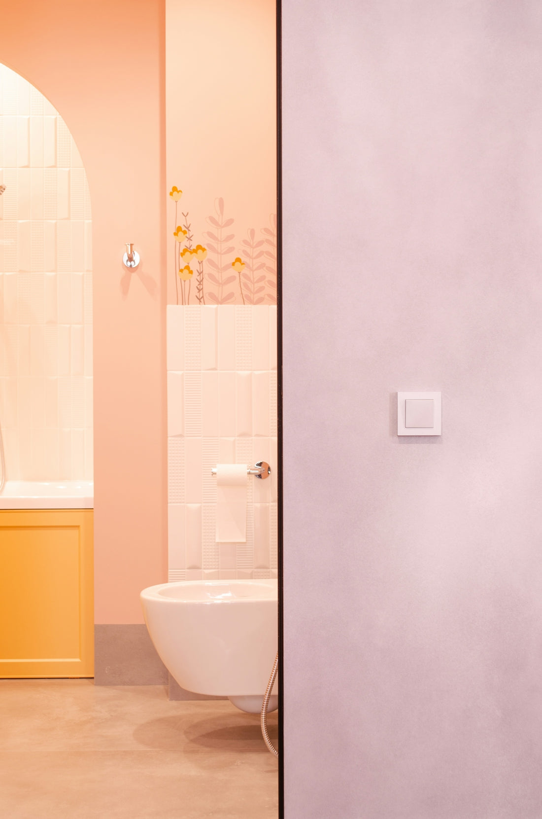 A bathroom with a toilet and a sink